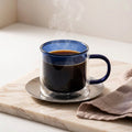 Mirage™ Glass Mug — Ocean Blue (lifestyle)