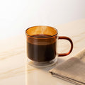 Mirage™ Glass Mug — Warm Amber (lifestyle)